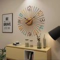 Golden Sunburst Metal Wall Clock with Colourful Numbers
