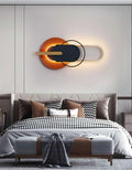 Black Oval Orange Disc Gold Ring Metal Wall Art