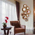 Gold Sunburst Disc Cluster Metal Wall Mirror